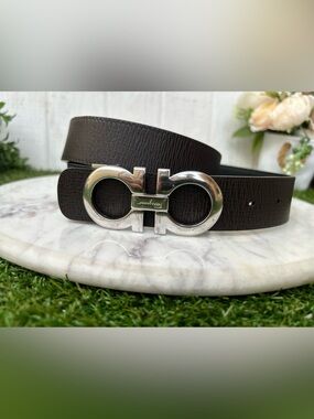 Ferragamo Reversible and adjustable Gancini belt  $595 Color: Black/Dark brown